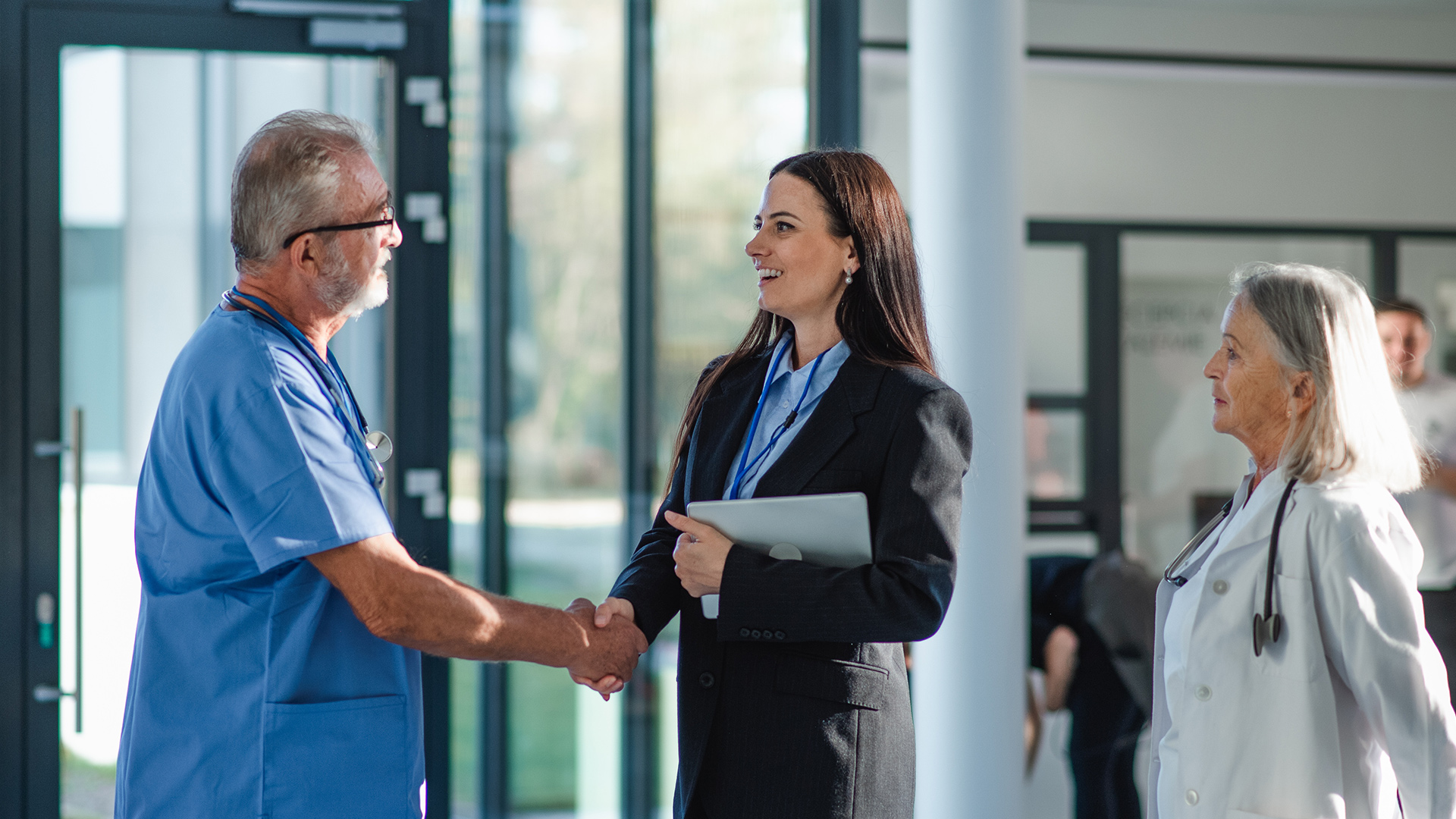 Clinical setting doctor and nurse with prospective MHA student