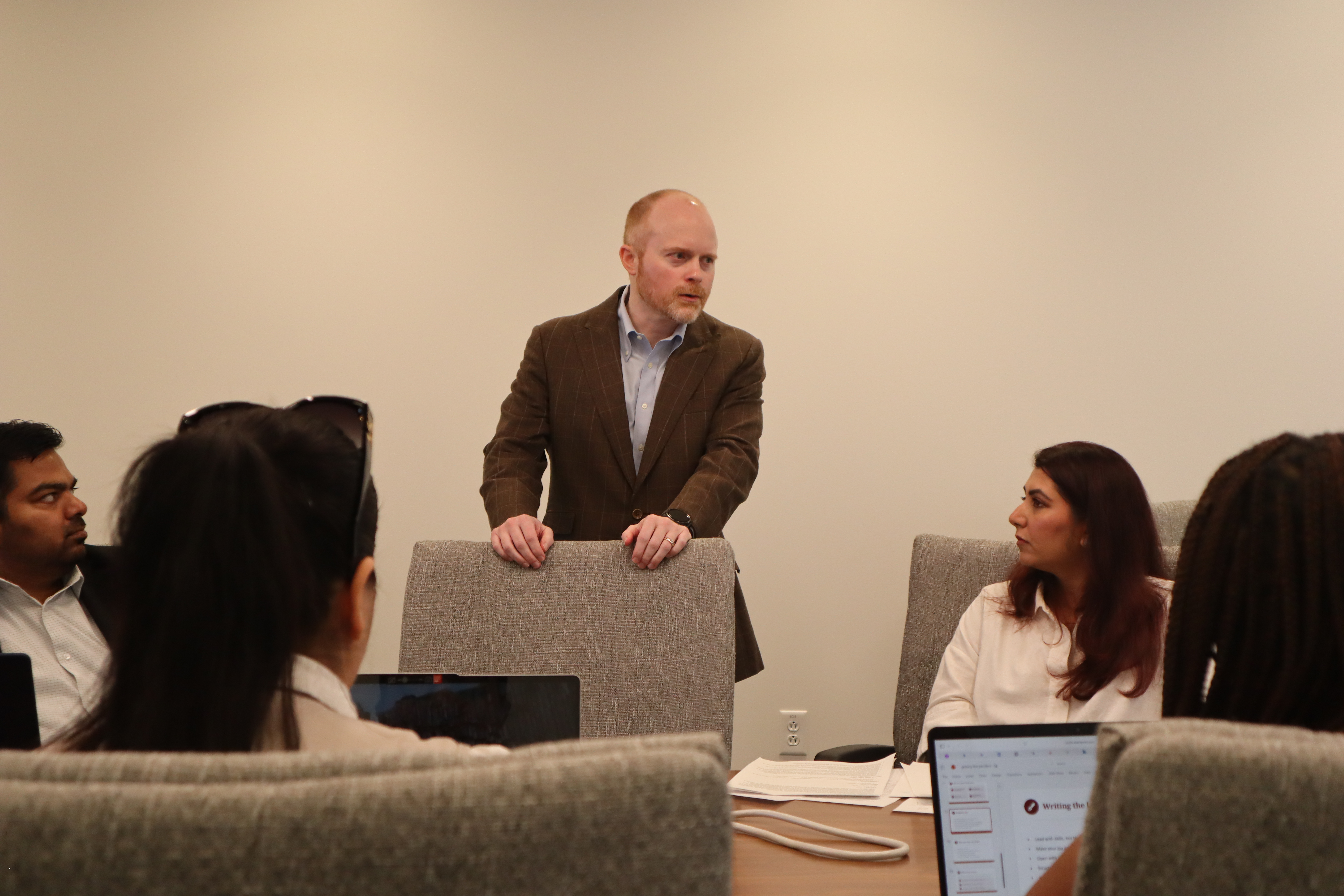 Photo of Dr. Jordan Mitchell prepping fellows