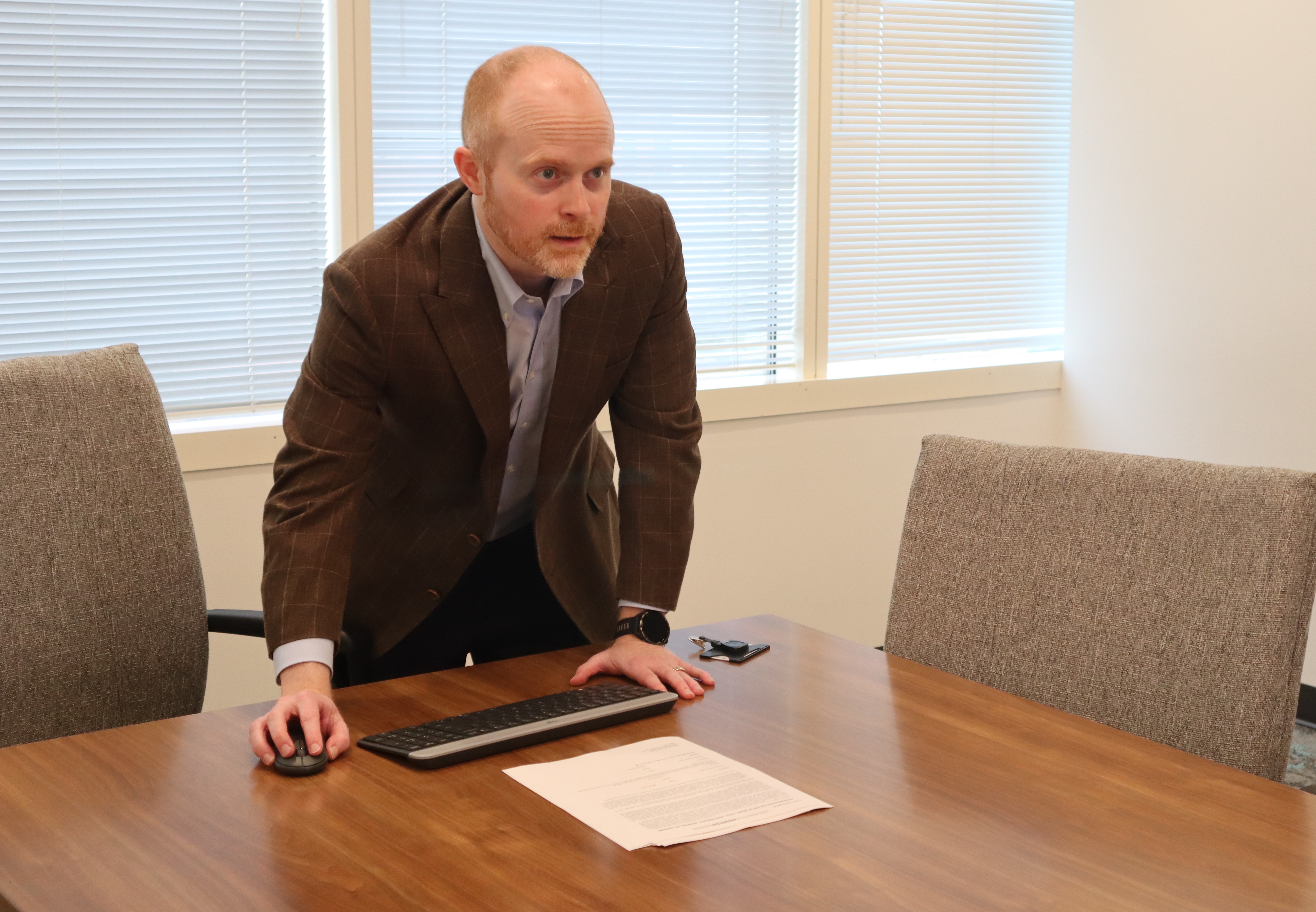 Dr. Jordan Mitchell preps for class