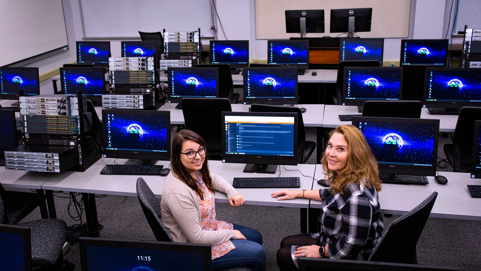 Photo of Assistant Professor of Information Technology Lisa Lacher and her research assistant, senior Cydnee Biehl