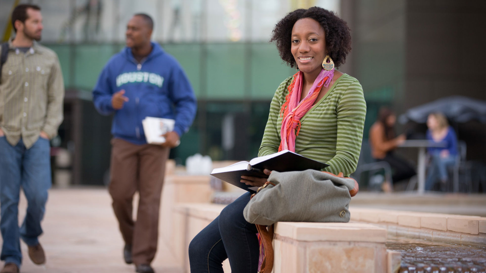 Student at Alumni Plaza