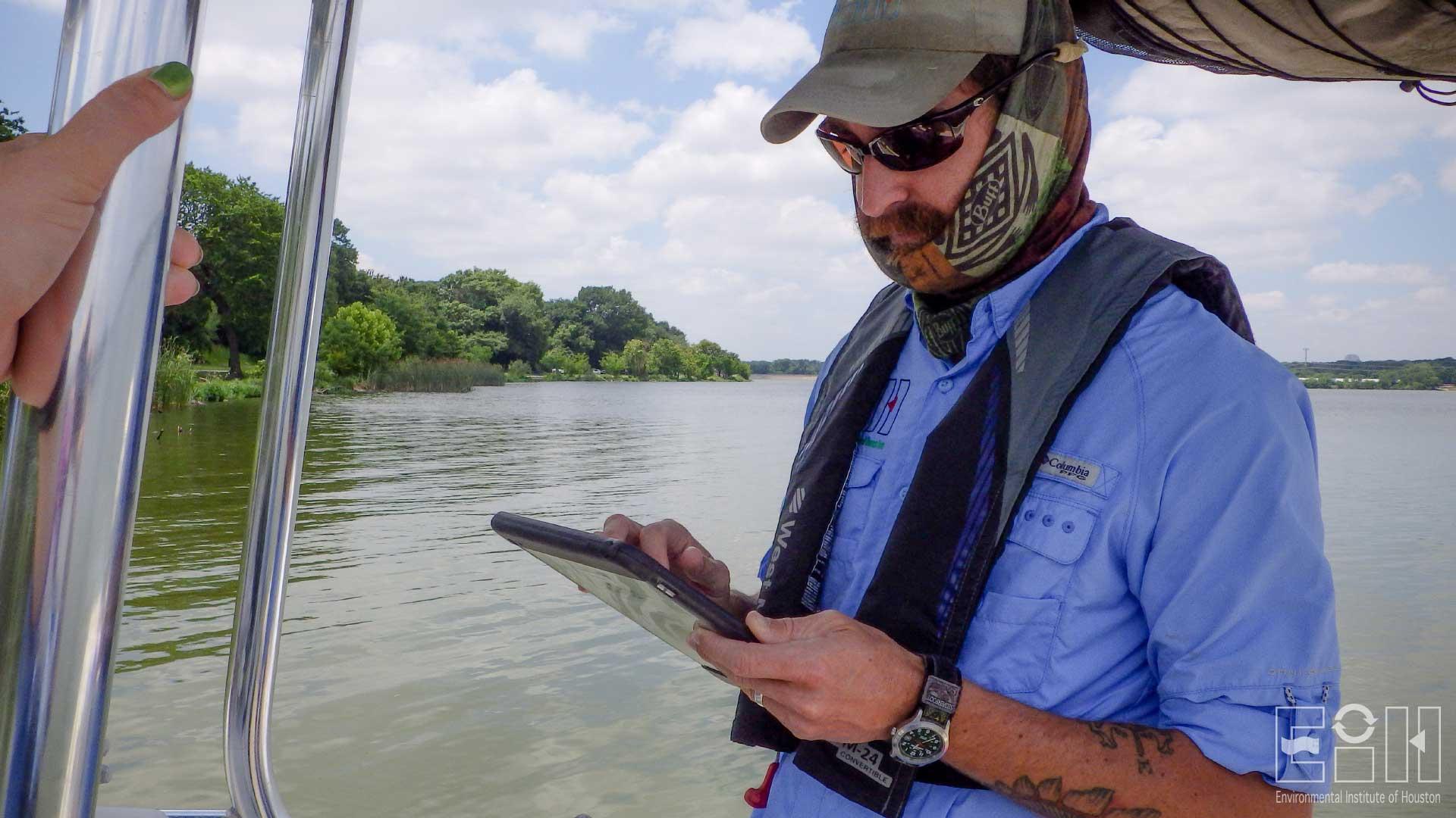 Cory Scanes, EIH research associate, at a site in White Rock Lake.