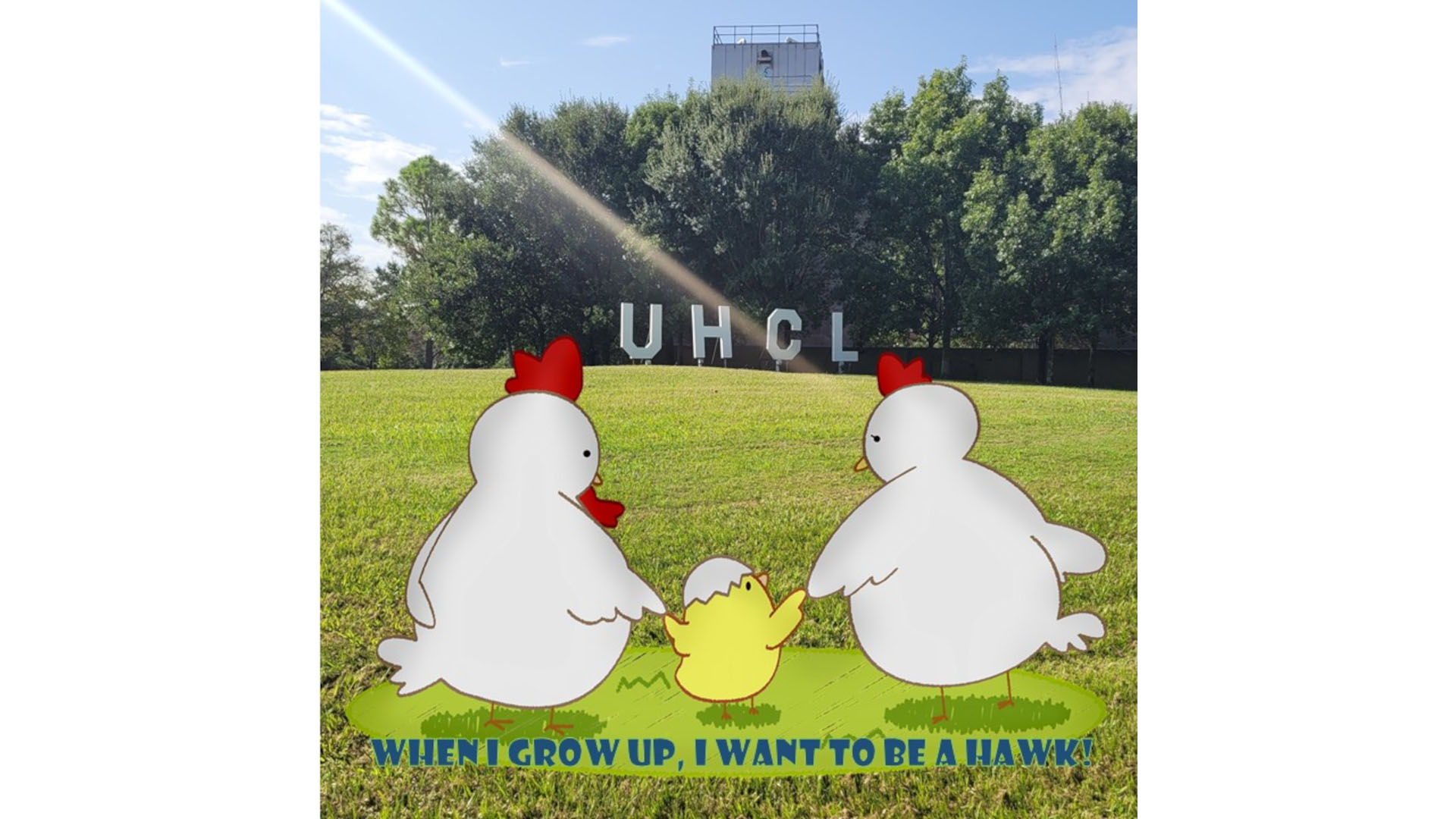 Title: When I Grow Up, I Want To Be A Hawk. Two chickens hold hands with a baby chick in front of the UHCL letters.