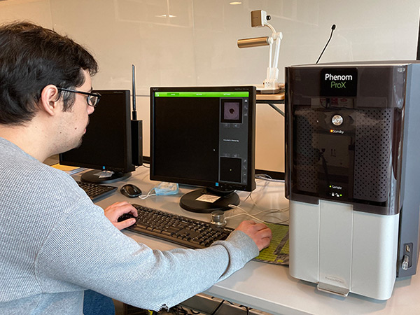 Student working at the Phenom ProX Scanning Electron Microscope