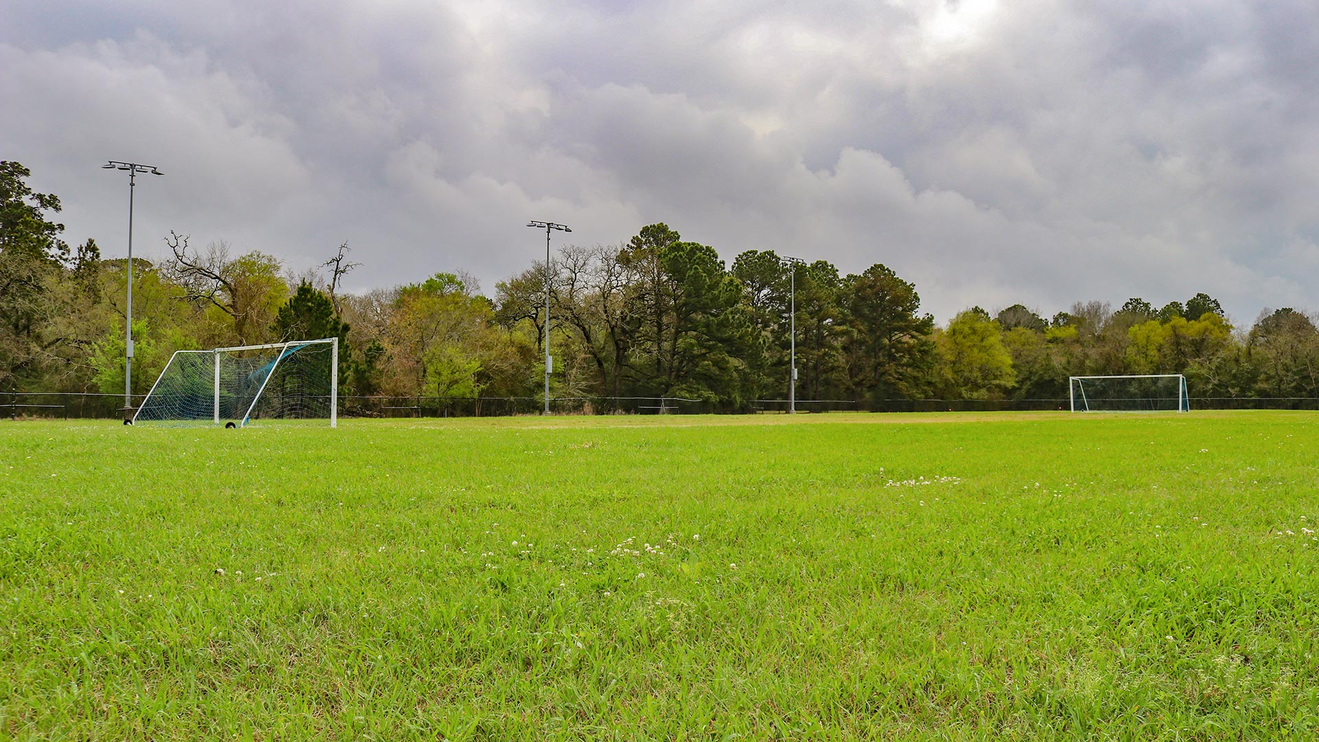 An outdoor athletic field with soccer goals at the Delta Field Complex