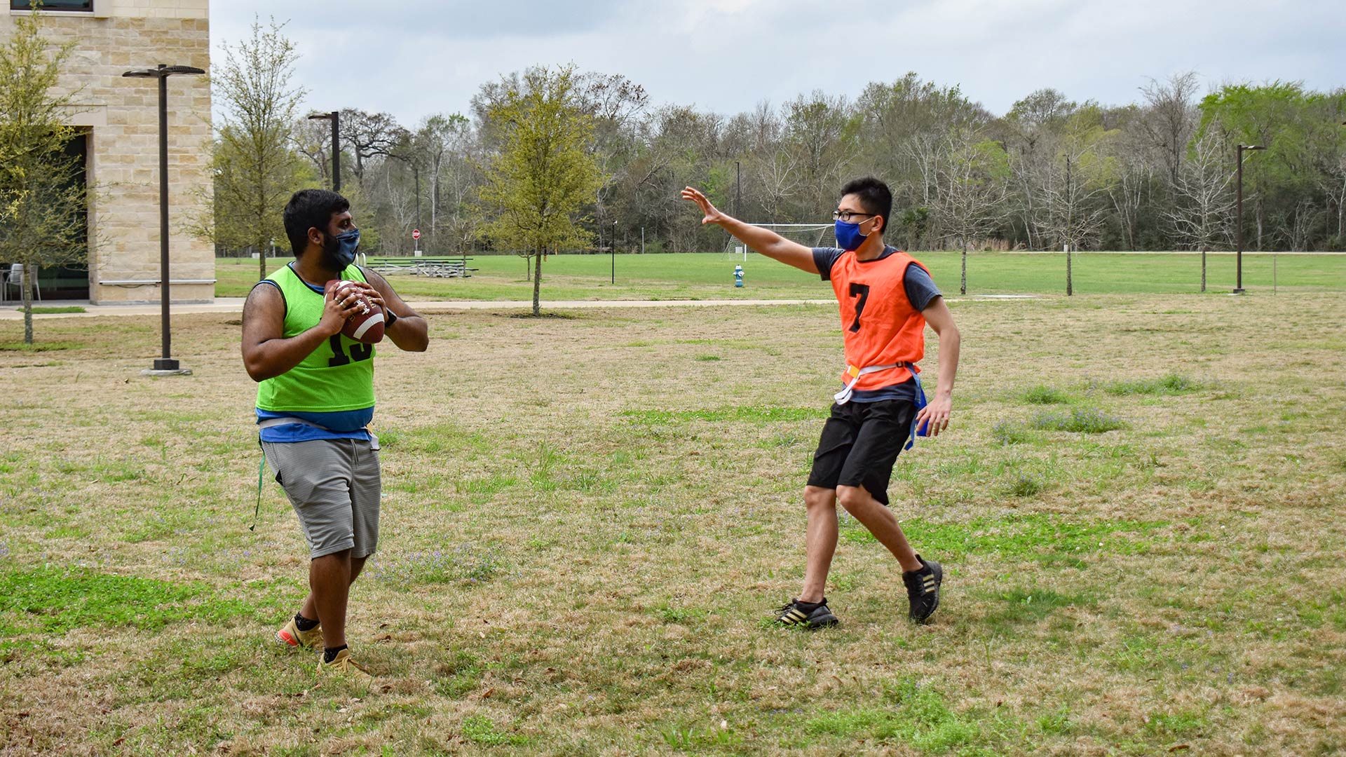UHCL students playing tag football.