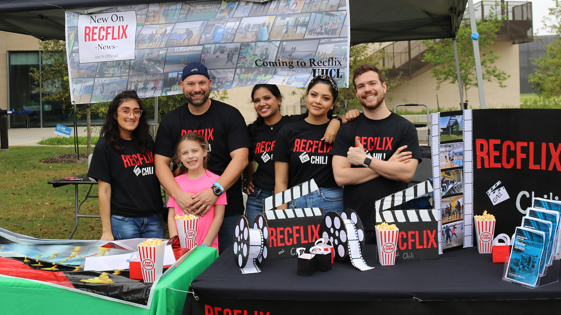 Staff gathered at a RecFlix event at the Recreation and Wellness Center