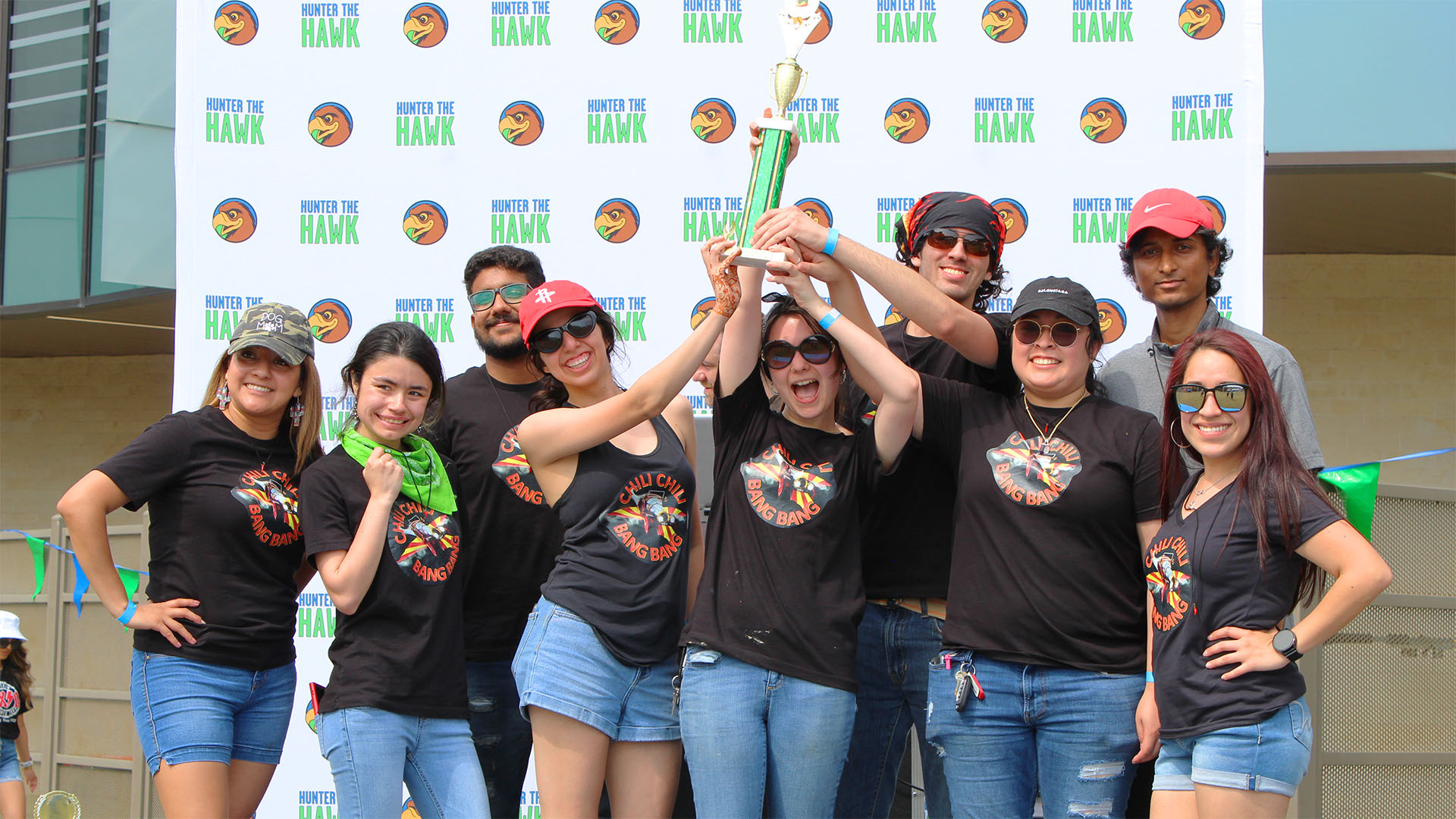 Students posing with a trophy